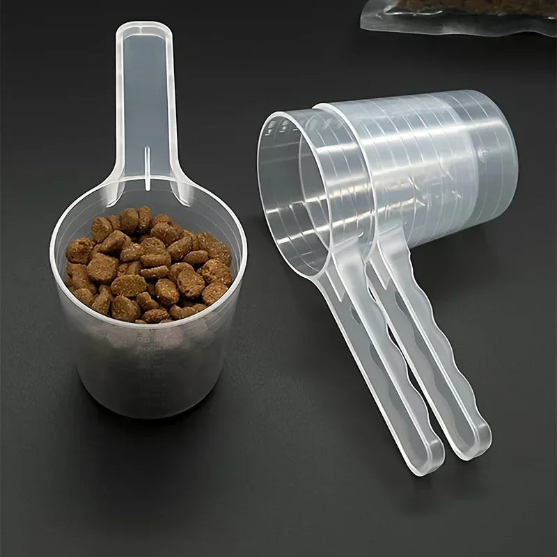 Cuchara medidora transparente para alimento de mascotas (100 ml)