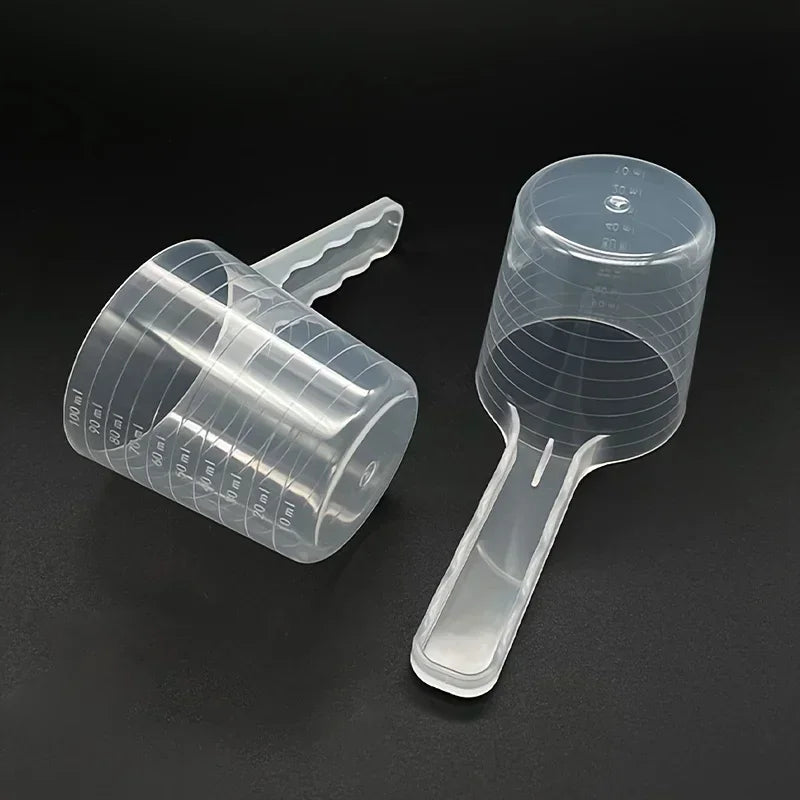 Cuchara medidora transparente para alimento de mascotas (100 ml)