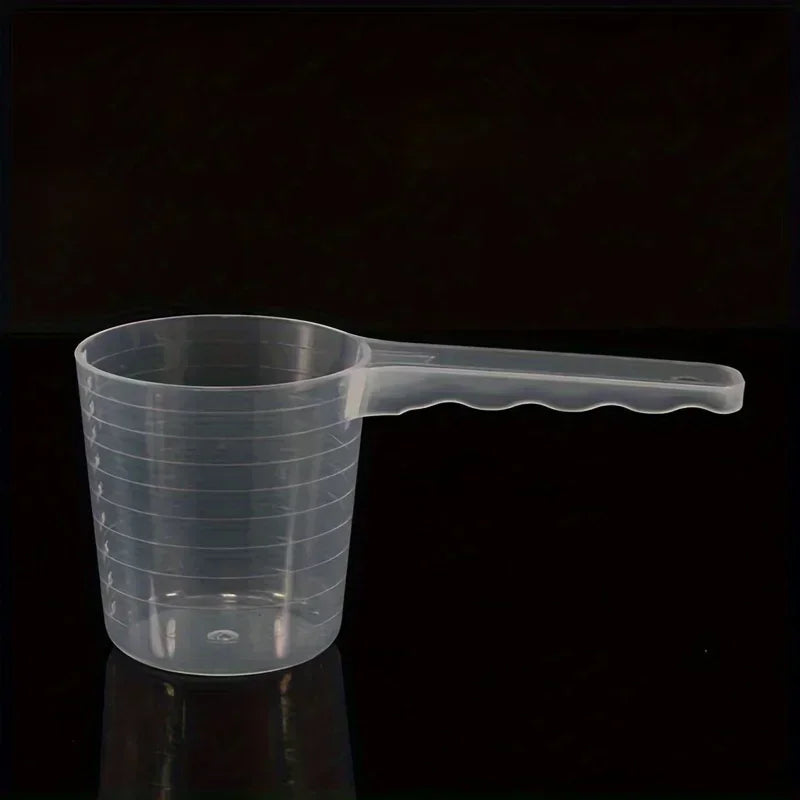 Cuchara medidora transparente para alimento de mascotas (100 ml)
