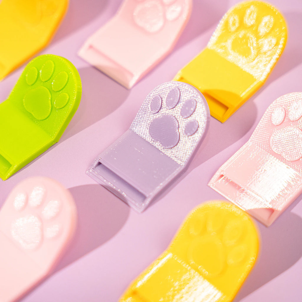 Abrelatas en forma de patita para comida húmeda de mascotas