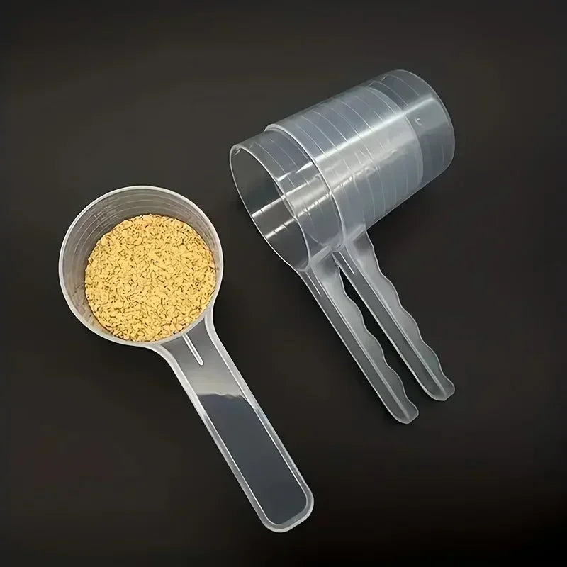 Cuchara medidora transparente para alimento de mascotas (100 ml)